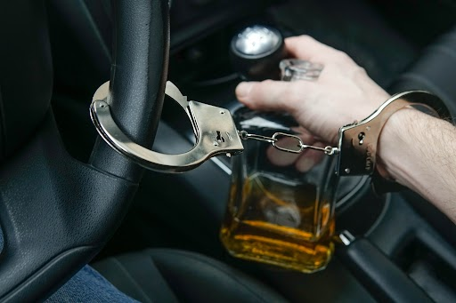 DUI Lawyer image of some handcuffed because they were drinking and driving